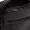 Bolso tipo reporterito con estampado de bandera