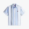 Camisa de rayas de tejido dobby de corte holgado de Tommy Jeans Camisa de rayas de tejido dobby de corte holgado de Tommy Jeans