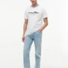 Camiseta a rayas con logotipo náutico