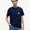 Camiseta con bolsillo y logotipo floral Camiseta con bolsillo y logotipo floral
