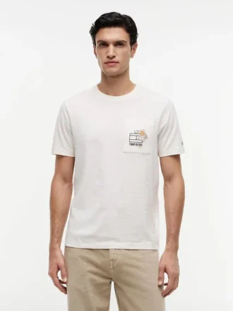Camiseta con bolsillo y logotipo floral