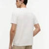 Camiseta con bolsillo y logotipo floral