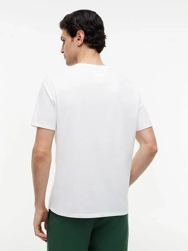 Camiseta con logotipo floral tropical Camiseta con logotipo floral tropical