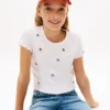 Camiseta de niño con estrellas bordadas y canalé