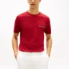 Camiseta de piqué con bolsillo y rayas características Camiseta de piqué con bolsillo y rayas características