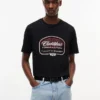 Camiseta Globe de Tommy x Cadillac F1® Team Camiseta Globe de Tommy x Cadillac F1® Team