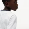 Camiseta infantil con el logotipo de la raya de la bandera