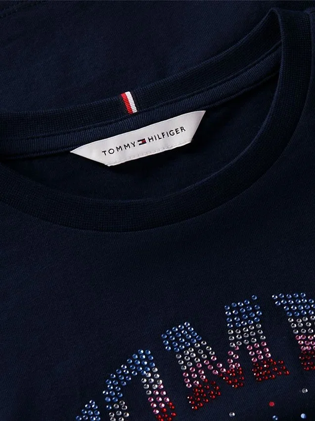 Camiseta infantil con el logotipo de Tommy y pedrería Camiseta infantil con el logotipo de Tommy y pedrería