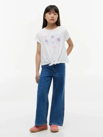 Camiseta infantil con lazo delantero y concha
