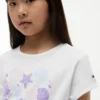 Camiseta infantil con lazo delantero y concha Camiseta infantil con lazo delantero y concha