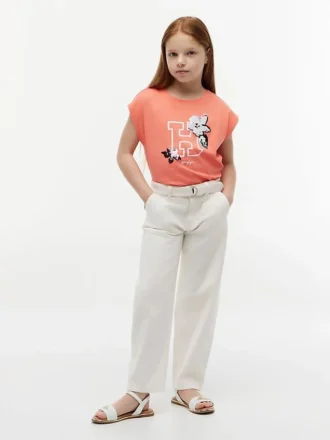 Camiseta infantil con logo floral de lentejuelas
