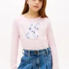 Camiseta infantil con monograma floral Camiseta infantil con monograma floral