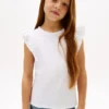 Camiseta infantil con volantes y ojales bordados Camiseta infantil con volantes y ojales bordados