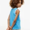 Camiseta sin mangas para niños con el logotipo de Tommy en letra cursiva