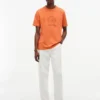 Camiseta teñida en prenda con logotipo de hoja de laurel
