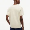Camiseta teñida en prenda con logotipo de hoja de laurel