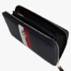 Cartera con cremallera y rayas distintivas Cartera con cremallera y rayas distintivas
