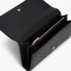 Cartera grande con solapa y monograma integral Cartera grande con solapa y monograma integral