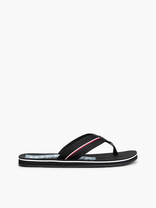 Chanclas con rayas distintivas Chanclas con rayas distintivas