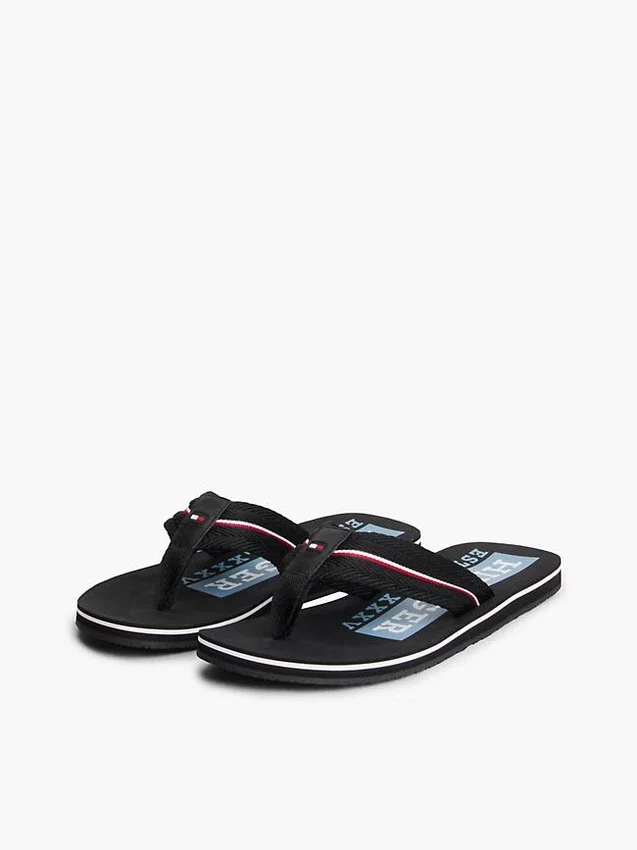 Chanclas con rayas distintivas Chanclas con rayas distintivas