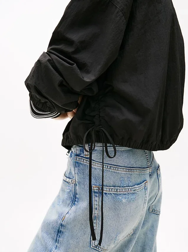 Chaqueta con cremallera repelente al agua de Tommy Jeans Chaqueta con cremallera repelente al agua de Tommy Jeans