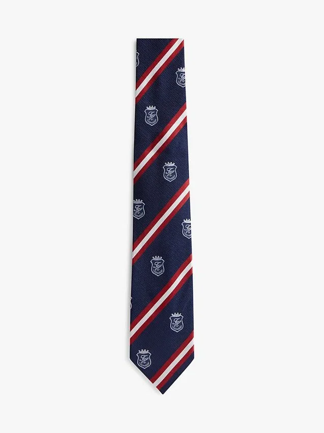 Corbata de seda a rayas con monograma y escudo Corbata de seda a rayas con monograma y escudo