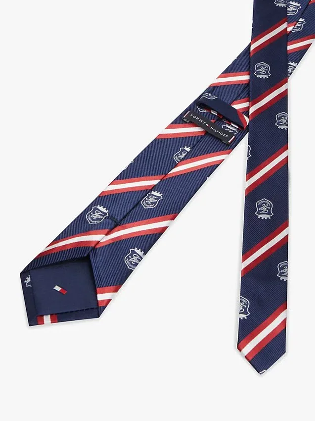 Corbata de seda a rayas con monograma y escudo Corbata de seda a rayas con monograma y escudo