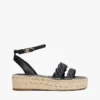 Espadrillas con plataforma y tiras retorcidas de cuero Espadrillas con plataforma y tiras retorcidas de cuero