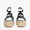 Espadrillas con plataforma y tiras retorcidas de cuero Espadrillas con plataforma y tiras retorcidas de cuero