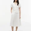 Falda midi con ojales bordados Falda midi con ojales bordados
