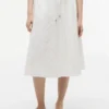 Falda midi con ojales bordados Falda midi con ojales bordados