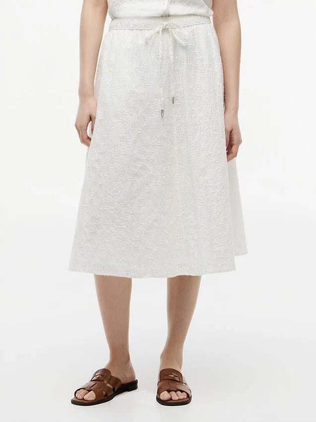 Falda midi con ojales bordados Falda midi con ojales bordados
