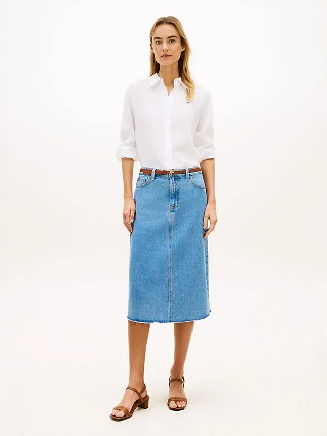 Falda midi vaquera con bajo sin rematar Falda midi vaquera con bajo sin rematar