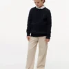 Jersey de punto trenzado para niña