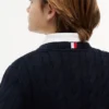 Jersey de punto trenzado para niña