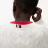 Jersey de punto trenzado para niña