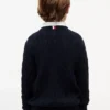 Jersey de punto trenzado para niña