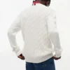 Jersey de punto trenzado para niña