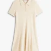 Minivestido polo de punto acanalado con botones dorados