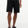 Pantalón corto plisado con cinturón de 25 cm y corte holgado Pantalón corto plisado con cinturón de 25 cm y corte holgado
