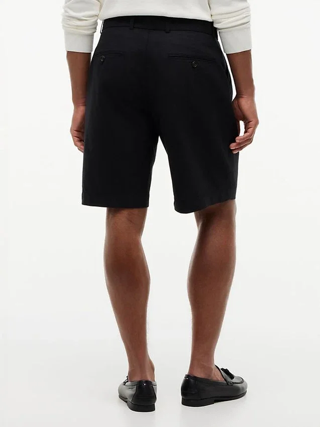 Pantalón corto plisado con cinturón de 25 cm y corte holgado Pantalón corto plisado con cinturón de 25 cm y corte holgado