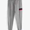 Pantalón de chándal con rayas distintivas Pantalón de chándal con rayas distintivas