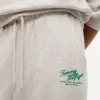 Pantalón de chándal de felpa con logo en letra cursiva Pantalón de chándal de felpa con logo en letra cursiva