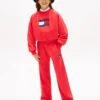 Pantalón de chándal infantil con logotipo de bandera ondulada Pantalón de chándal infantil con logotipo de bandera ondulada