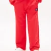 Pantalón de chándal infantil con logotipo de bandera ondulada Pantalón de chándal infantil con logotipo de bandera ondulada