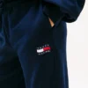 Pantalón de chándal infantil con logotipo de bandera ondulada