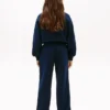 Pantalón de chándal infantil con logotipo de bandera ondulada