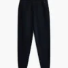 Pantalón jogger holgado liso