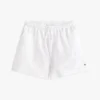 Pantalones cortos con ojales bordados para niños