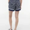 Pantalones cortos de voile con monograma en letra cursiva Pantalones cortos de voile con monograma en letra cursiva